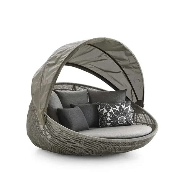 A close-up of the cushion fabric, emphasizing its dense weave and weather-resistant quality.