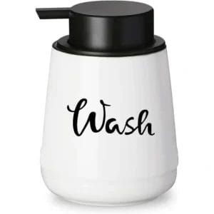 A guest easily pressing the pump of the Dispenser Bottles with one hand, demonstrating smooth operation.