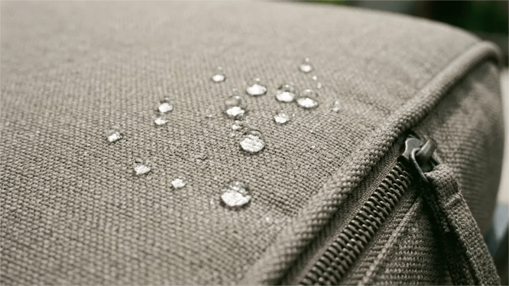 Close-up of water-repellent outdoor lounge chair seat cushions made with solution-dyed acrylic fabric for durability