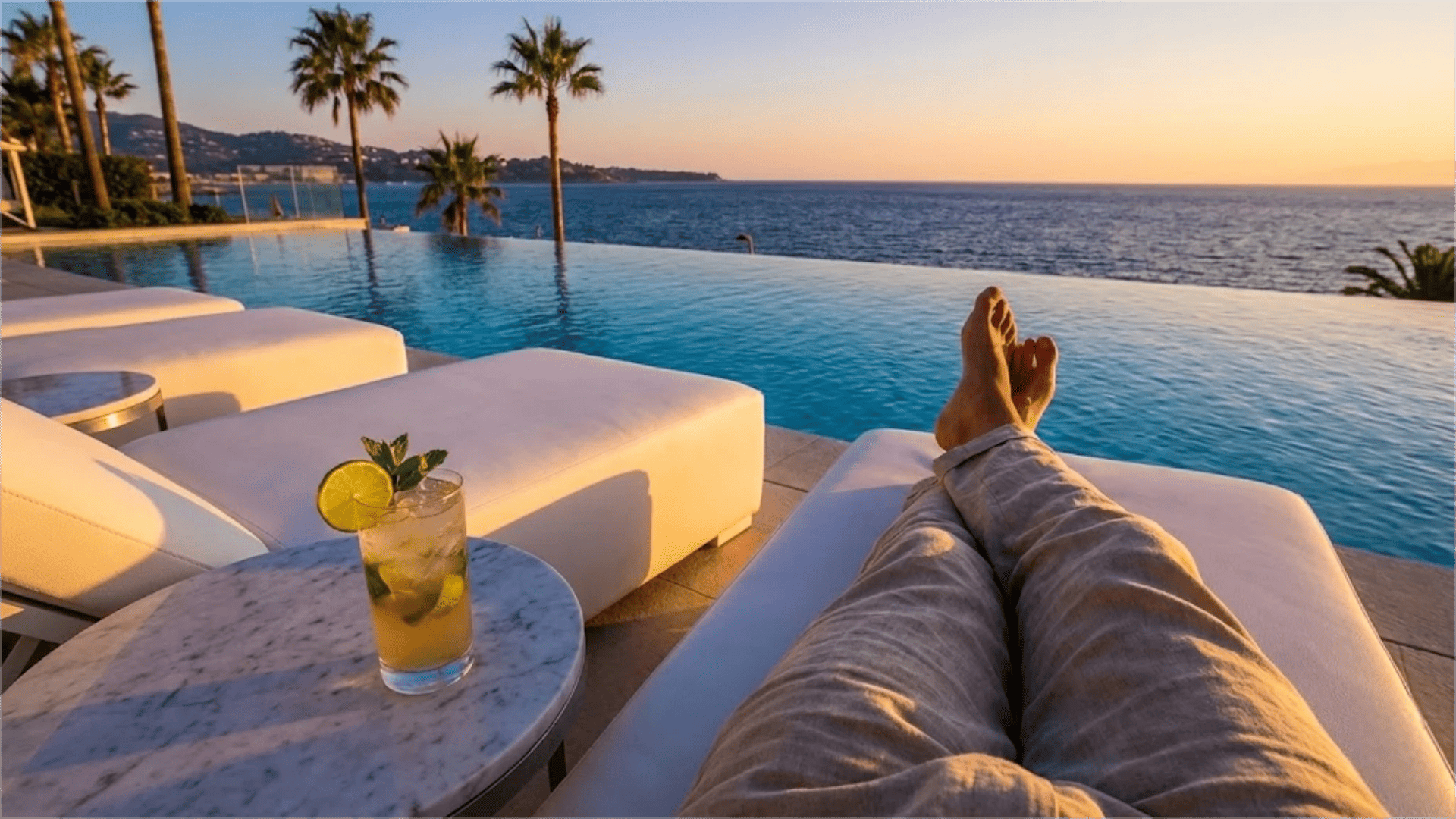 Aerial view of symmetrical commercial outdoor lounge chairs at a luxury resort pool, representing 2026 hotel furniture trends