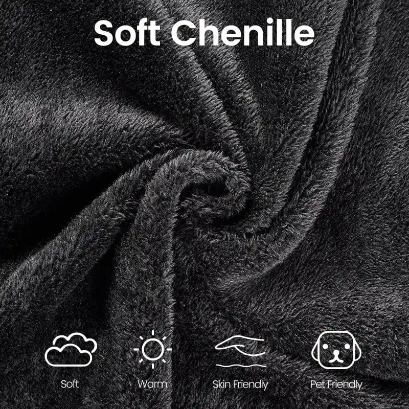 Close up texture of soft black chenille fabric on fold out foam sofa bed showing pet friendly features.