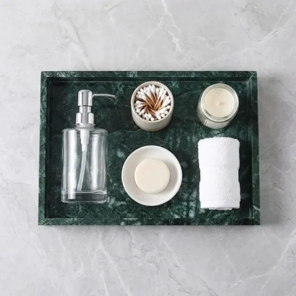 A durable Marble Stone Tray placed near a kitchen sink holding soap dispensers and a hot candle.