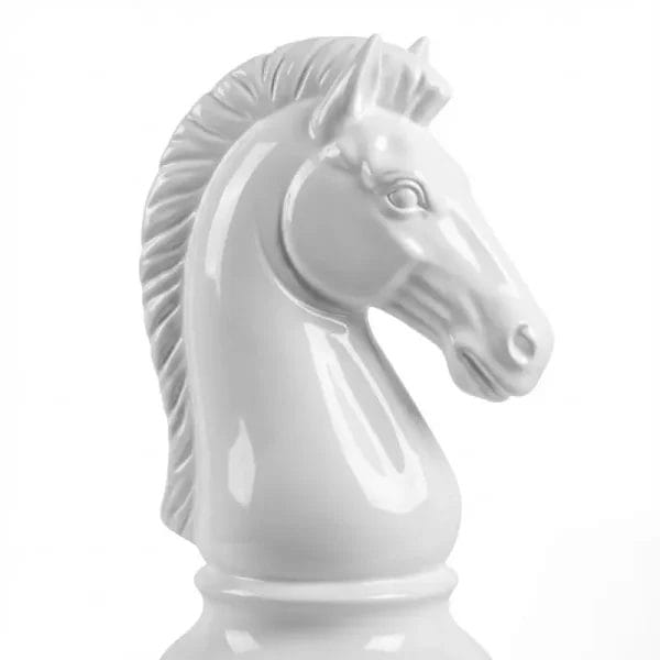 Close-up shot of a high-gloss white fiberglass giant chess knight sculpture showing smooth, premium automotive-grade finish.