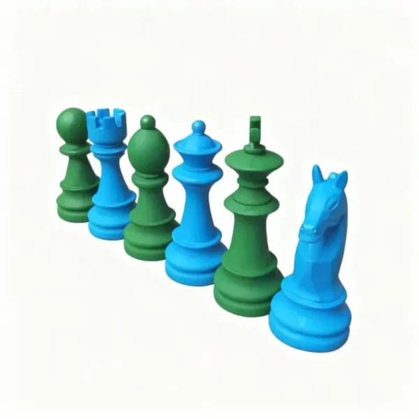 A lineup of giant chess pieces in custom matte Peacock Blue and Forest Green colors, featuring pawn, rook, bishop, queen, king, and knight.