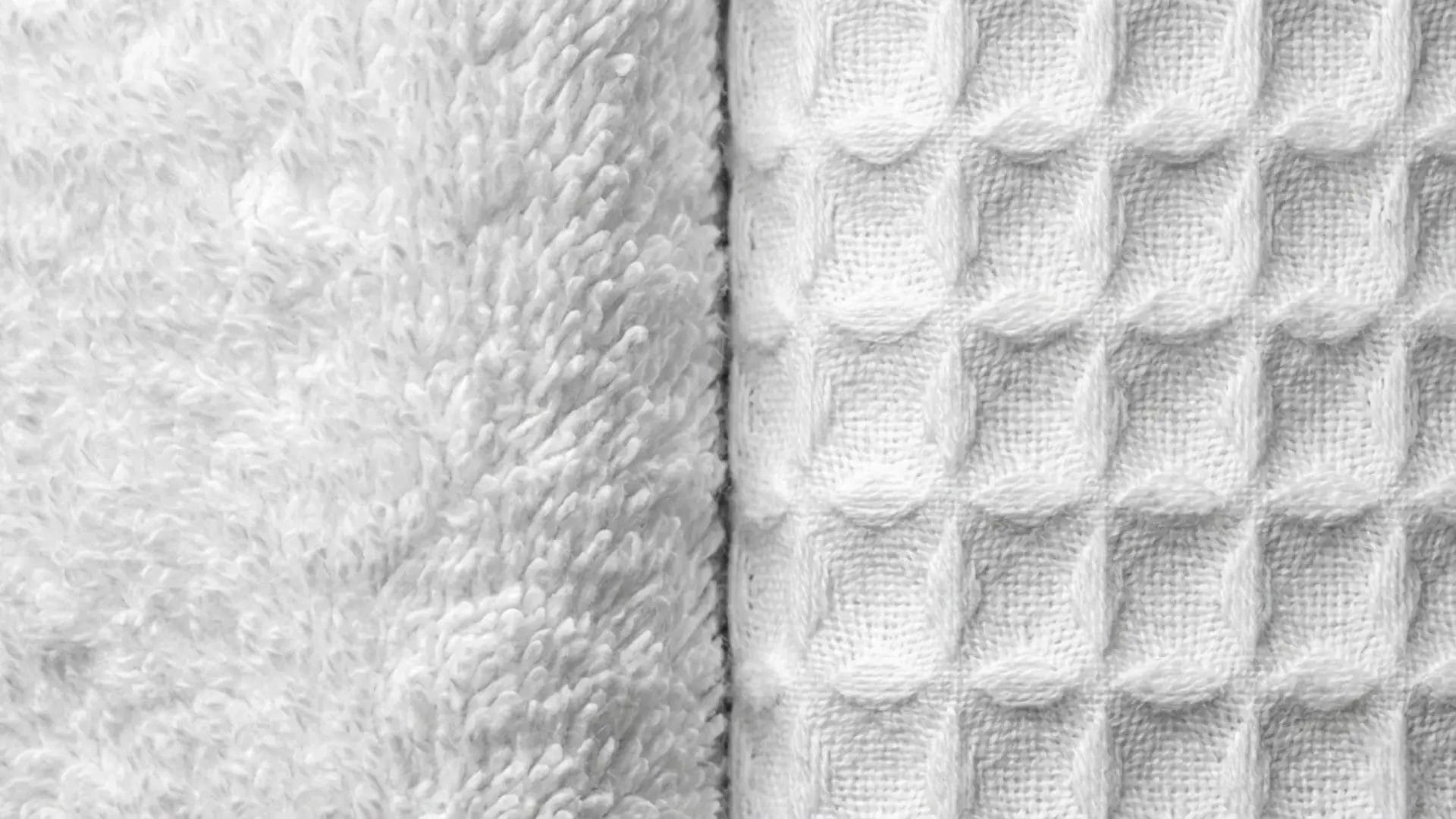 Side-by-side macro view of plush Terry cloth and textured Waffle weave.