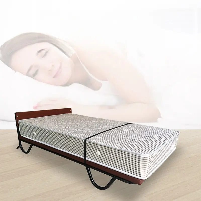 Cross-section view of a folding extra bed mattress, highlighting the specialized high-density memory foam top layer that provides superior pressure relief and a supportive sleep experience for multi-generational travelers.