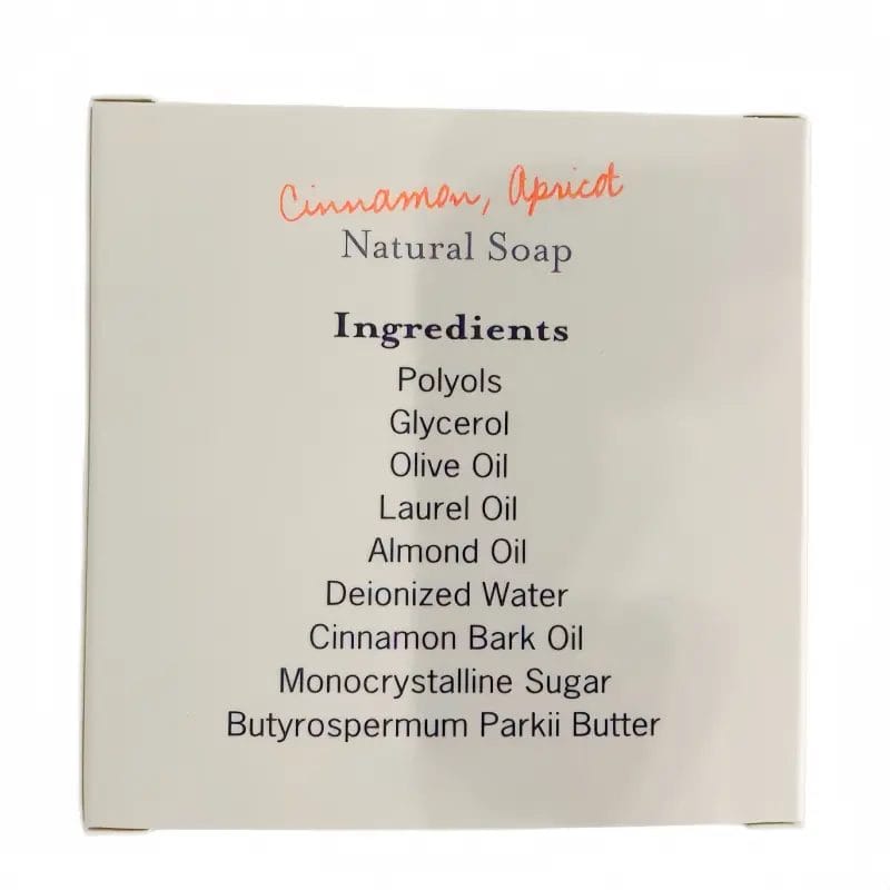 A beautifully wrapped BEAUTY Hotel Organic Natural Soap infused with cinnamon and apricot, resting on a luxury resort marble vanity.