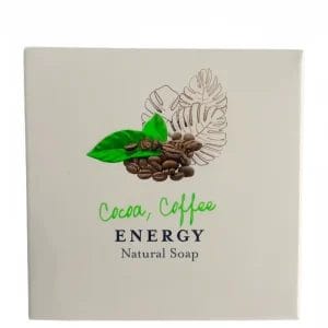 A beautifully packaged ENERGY Hotel Organic Natural Soap featuring coffee and cocoa extracts on a marble resort bathroom counter.