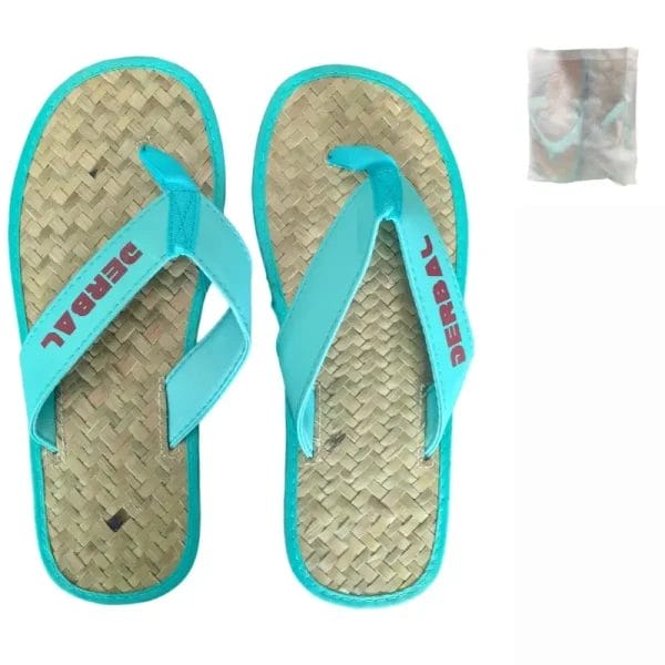 The Raffia Straw Flip Flops packaged elegantly inside a reusable, unbleached cotton drawstring bag.
