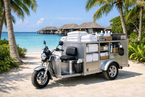 housekeeping efficiency tricycle parked on a sandy path at a luxury Maldives resort, loaded with supplies.