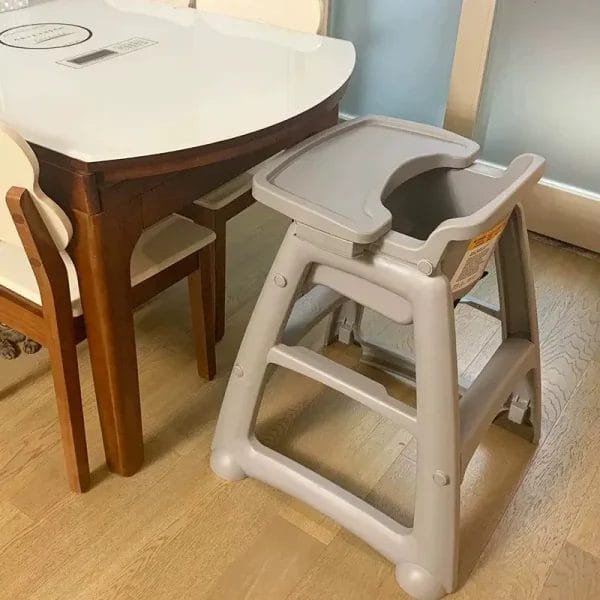 A high-end resort restaurant setup featuring clean, modern Baby High Chairs.