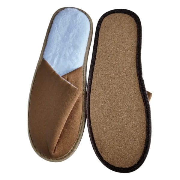 Close-up of the soft white coral fleece lining inside our Hotel Indoor Slippers.