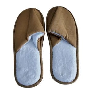 Moisture-resistant Hotel Indoor Slippers used in a luxury spa and wellness center.