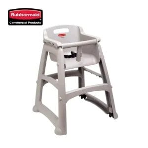 Vertical stacking of commercial Baby High Chairs in a hotel storage area.