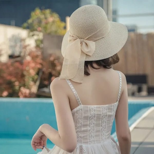 Internal sweatband with adjustable drawstring inside a Beach Sun Straw Hat.
