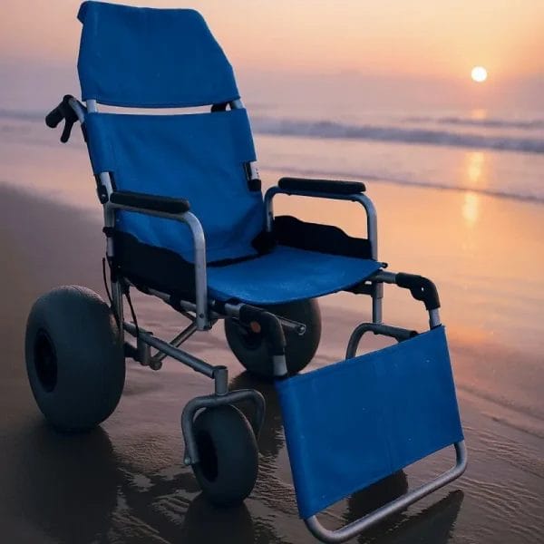 Island Beach Sand Wheelchair shown in a full 180-degree reclining position for maximum guest comfort.