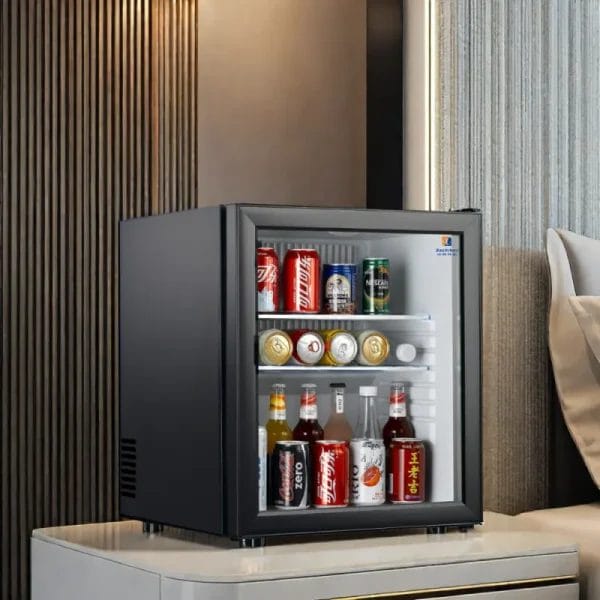 Close-up of the silent thermal absorption system in a hotel minibar.