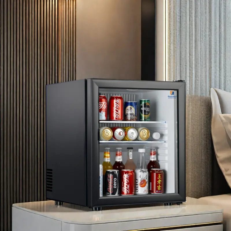 Close-up of the silent thermal absorption system in a hotel minibar.