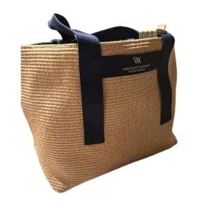 A stack of custom-branded Beach Tote Bag units ready for hotel procurement.